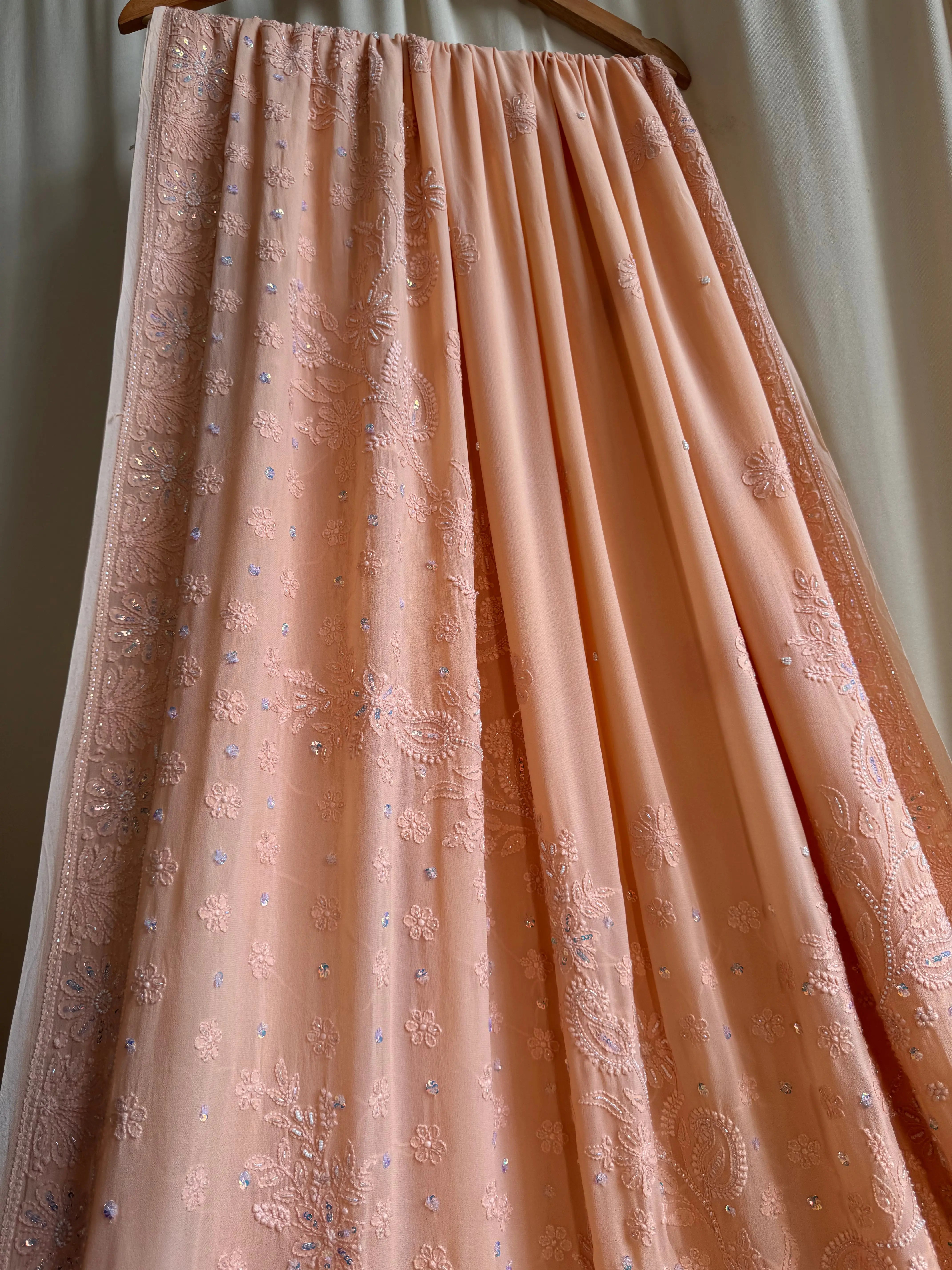 Viscose Peach Chikankari saree with Pearl embellishments ARIAA CHIKANKARI 