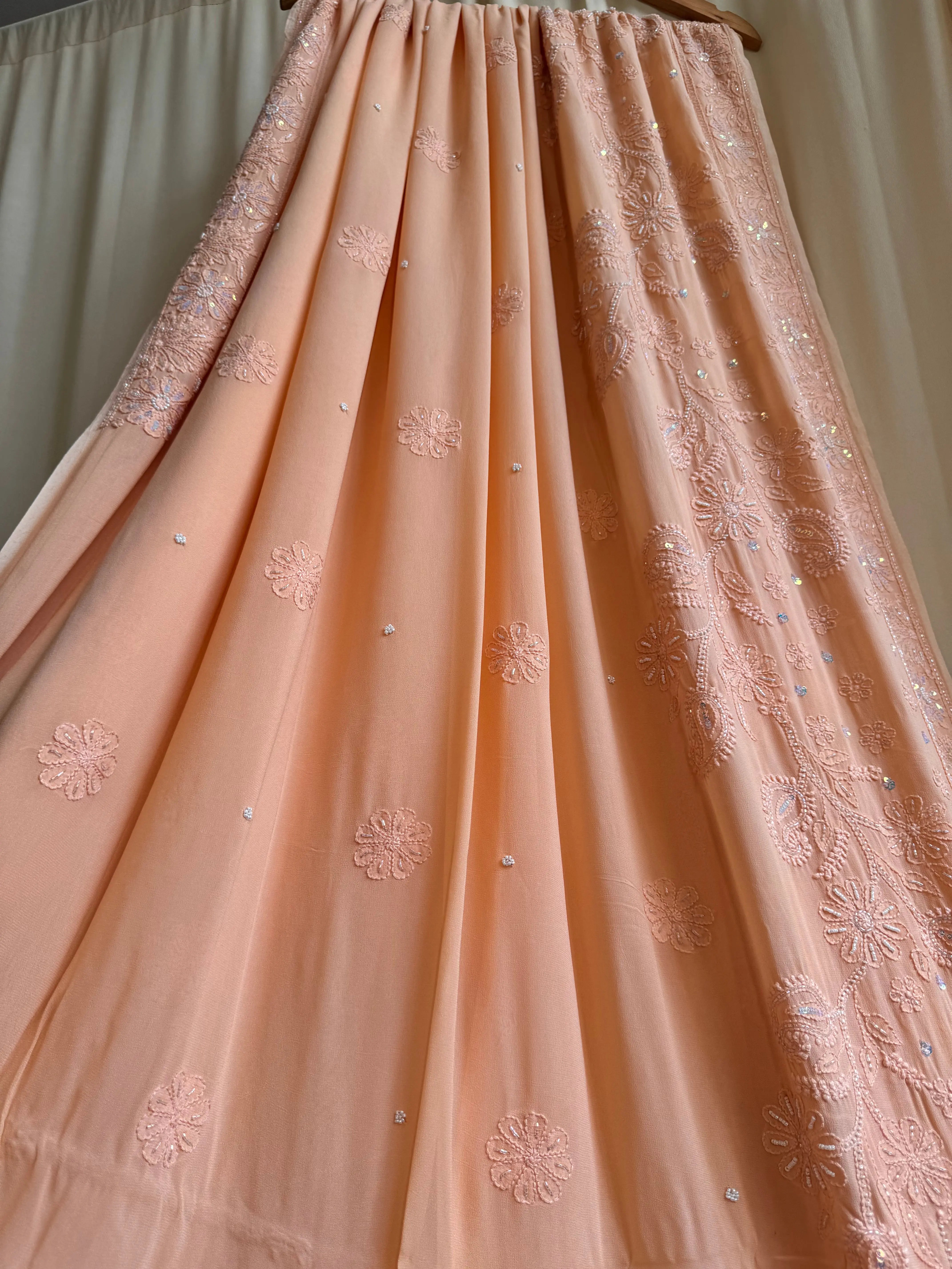 Viscose Peach Chikankari saree with Pearl embellishments ARIAA CHIKANKARI 