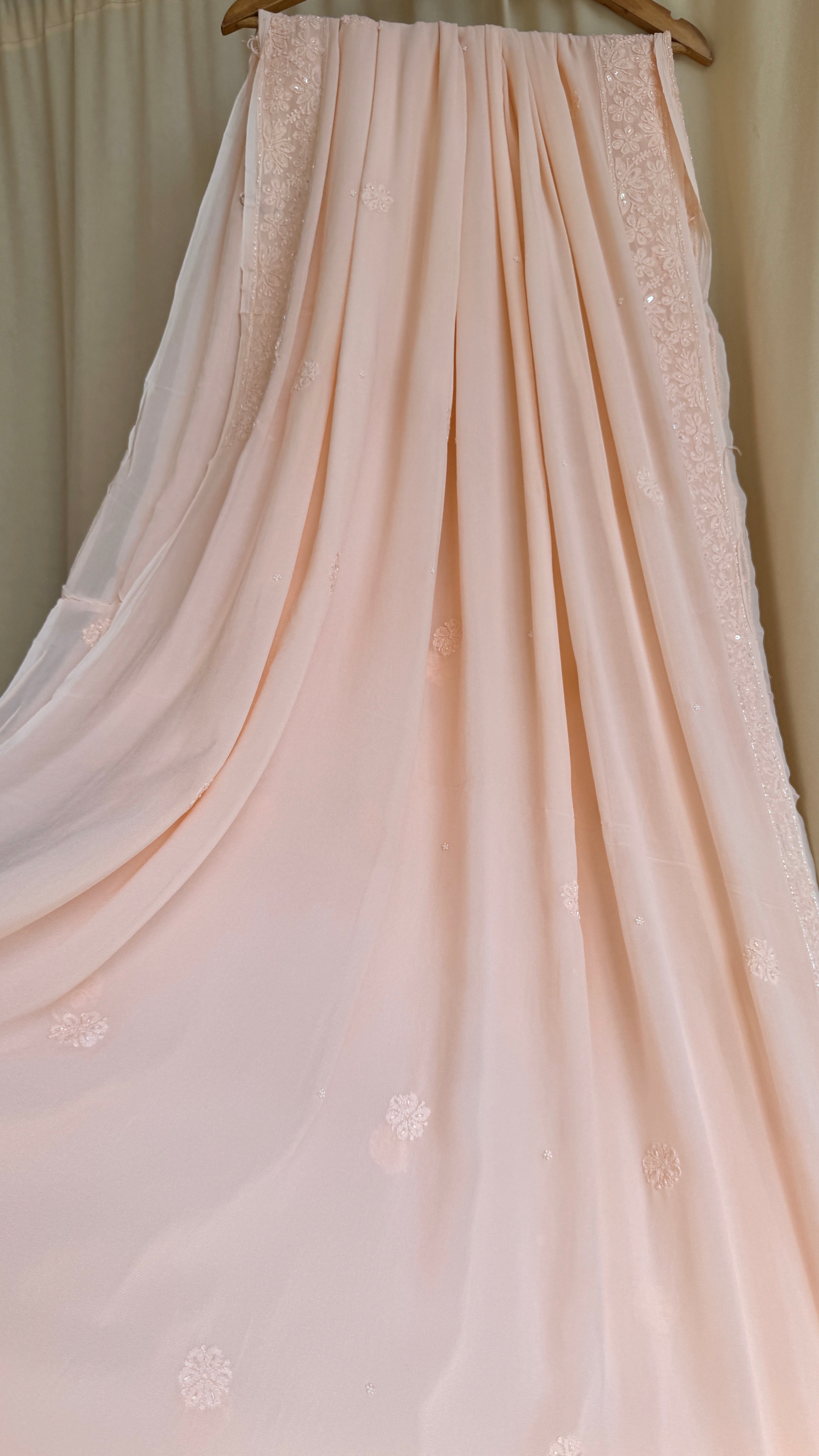 Viscose Peach Chikankari saree with Pearl embellishments