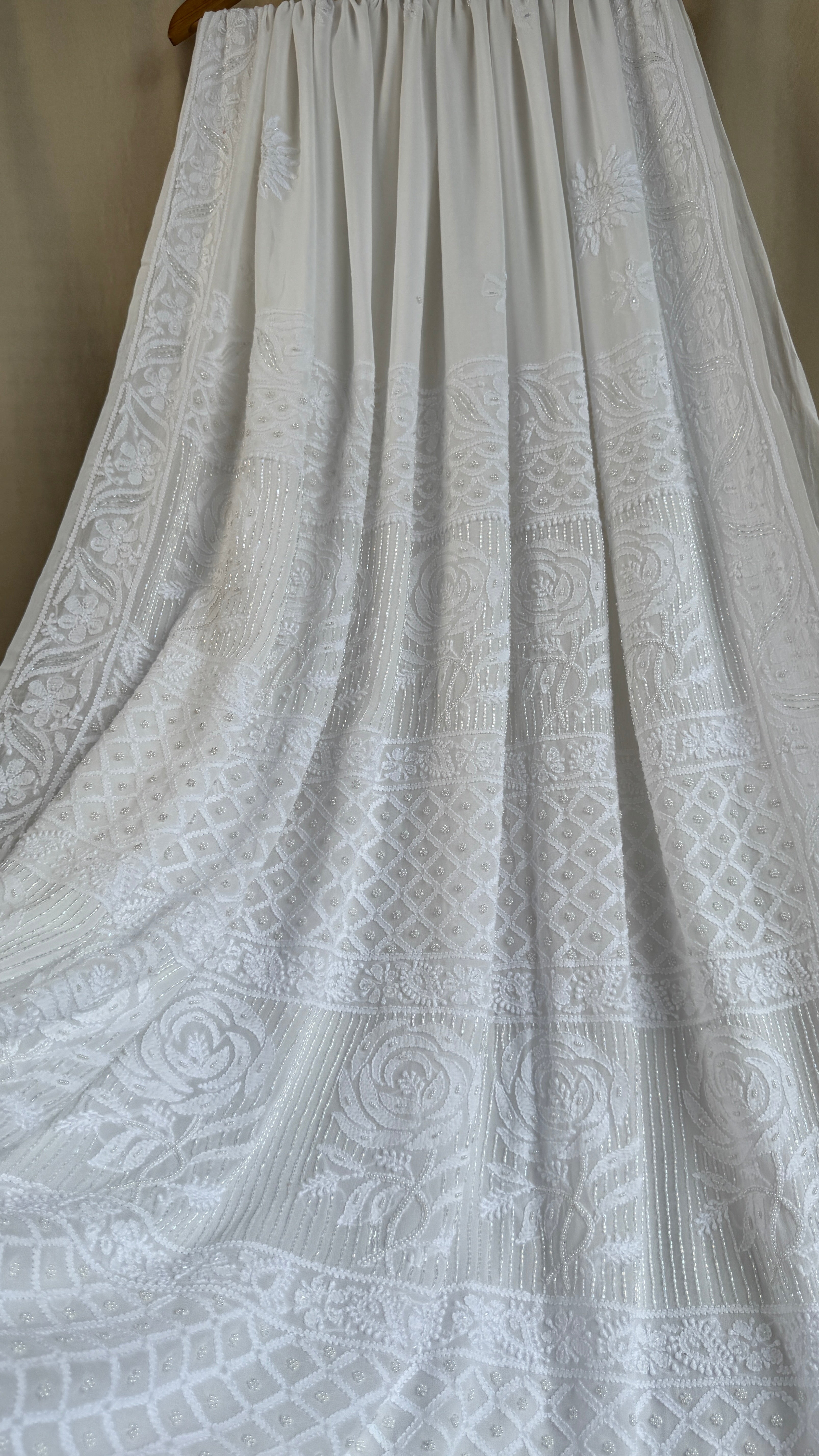 Viscose White Chikankari saree with Pearl embellishments